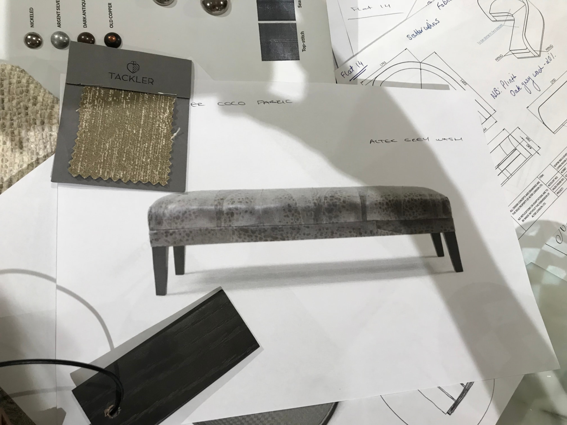 Lighting and hardware finish samples — nickeled, argent silver, dark antique and old copper studs beside a fabric swatch and joinery sketches